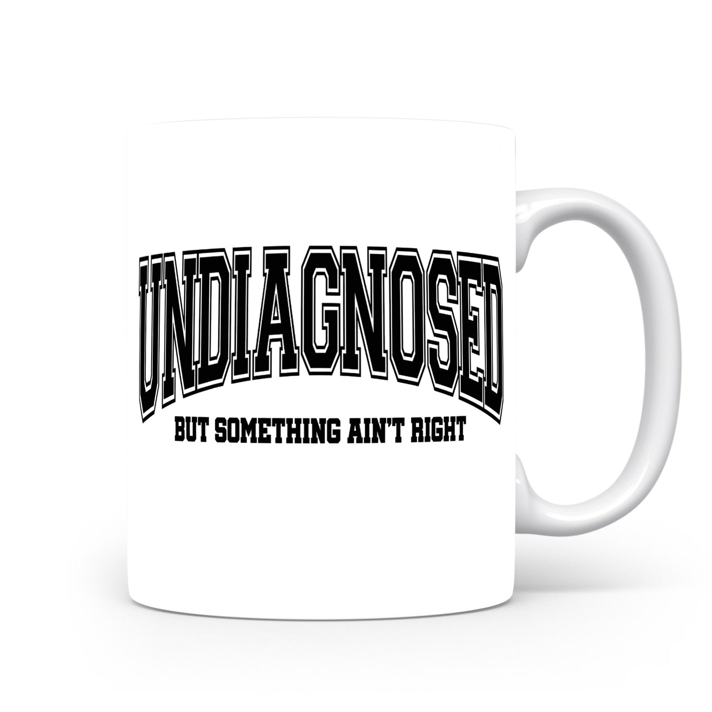 Hrnek s vtipným nápisem – UNDIAGNOSED