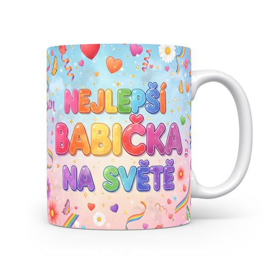Hrnek s nápisem NEJLEPŠÍ BABIČKA NA SVĚTĚ a veselými motivy na pastelovém pozadí.
