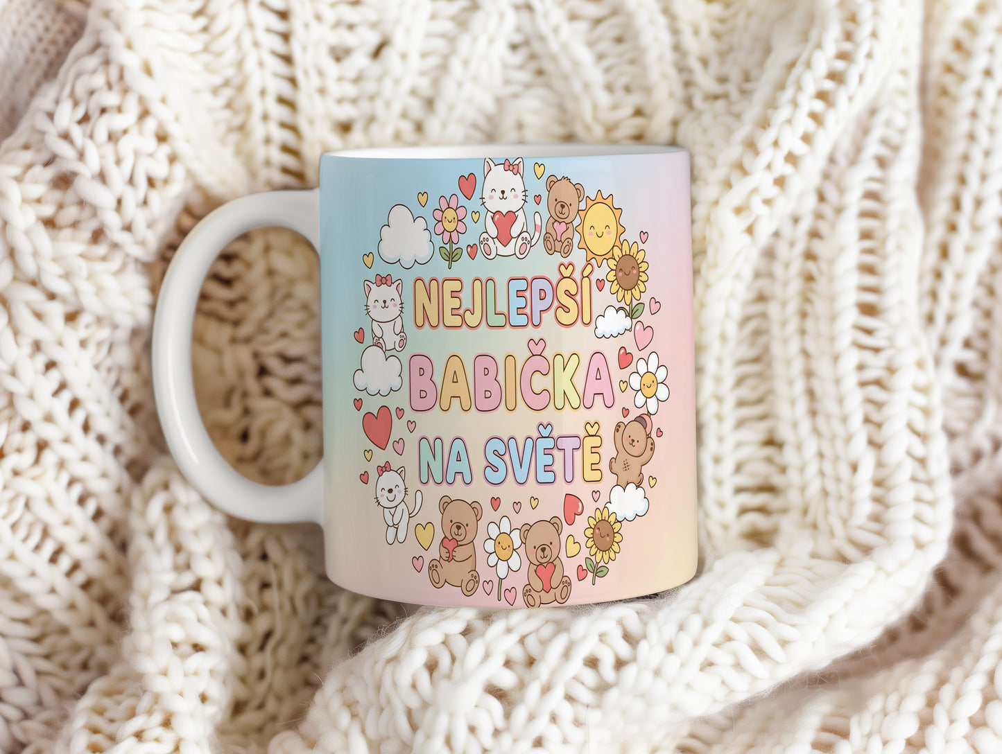 Hrnek s nápisem NEJLEPŠÍ BABIČKA NA SVĚTĚ a roztomilými motivy.
