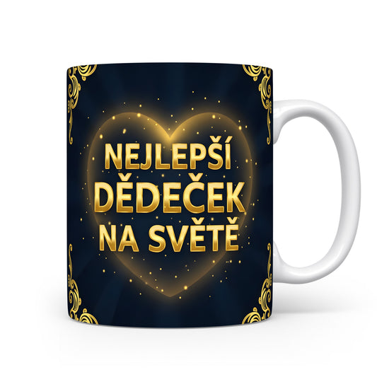 Hrnek s nápisem NEJLEPŠÍ DĚDEČEK NA SVĚTĚ a zlatými ornamenty.