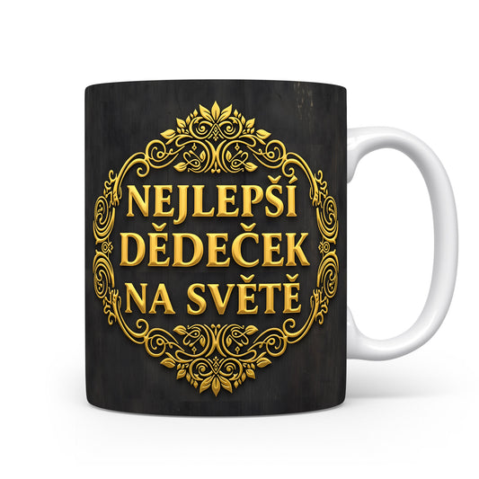 Černý hrnek se zlatými ornamenty a nápisem 'NEJLEPŠÍ DĚDEČEK NA SVĚTĚ'.