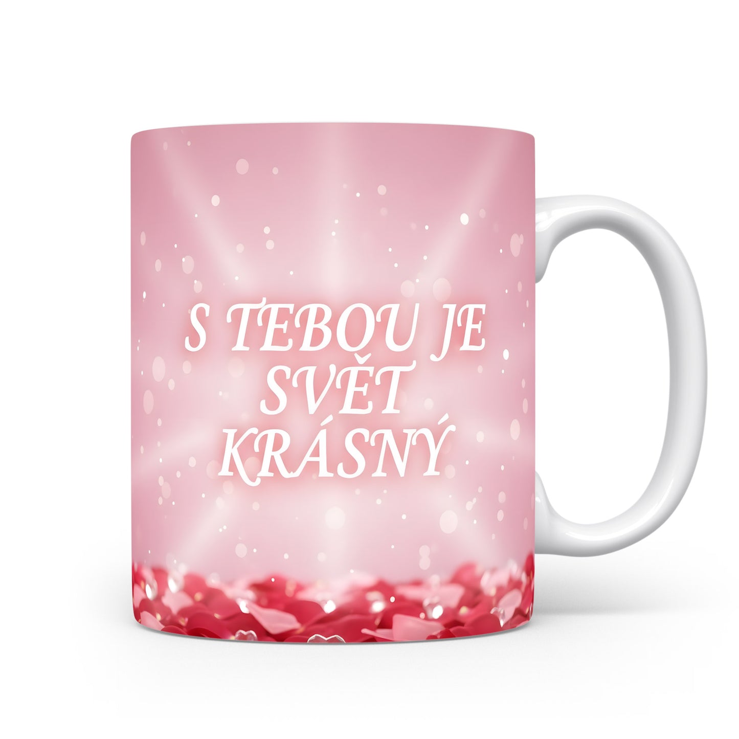 Růžový hrnek s nápisem S TEBOU JE SVĚT KRÁSNÝ a srdíčky.