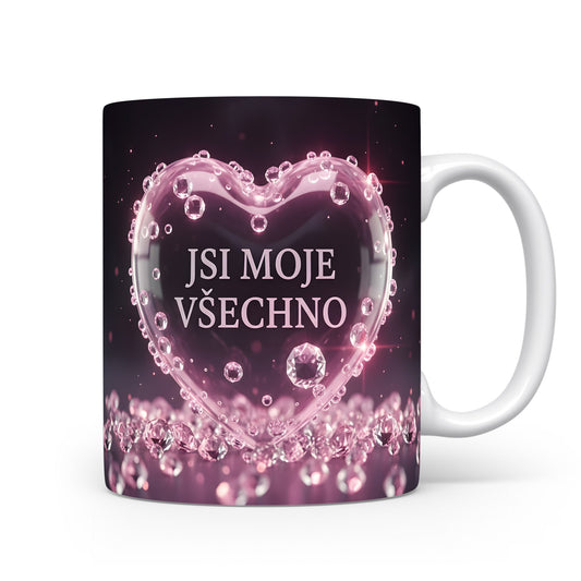 Růžové krystalové srdce na černém pozadí s textem JSI MOJE VŠECHNO.