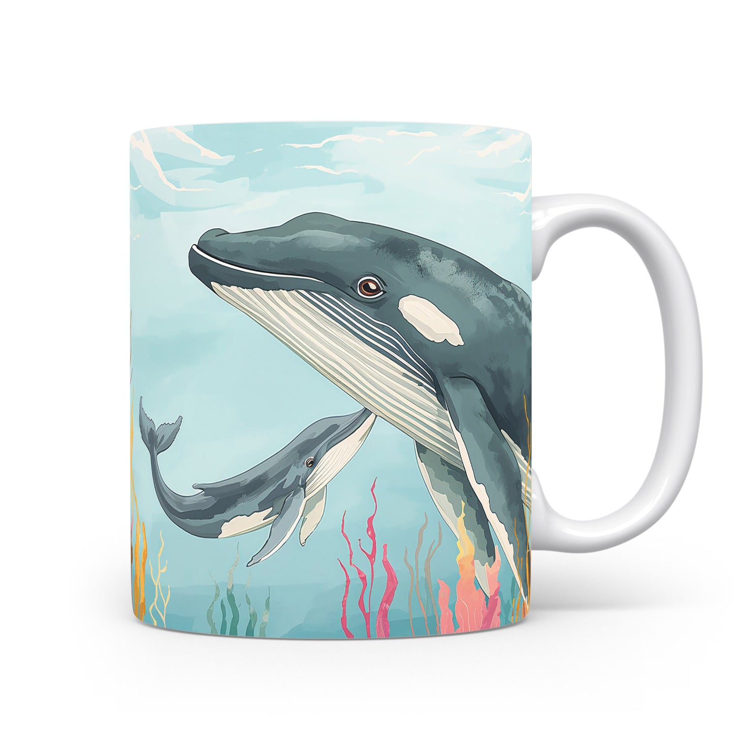 Velryby plující mezi korály na hrnku