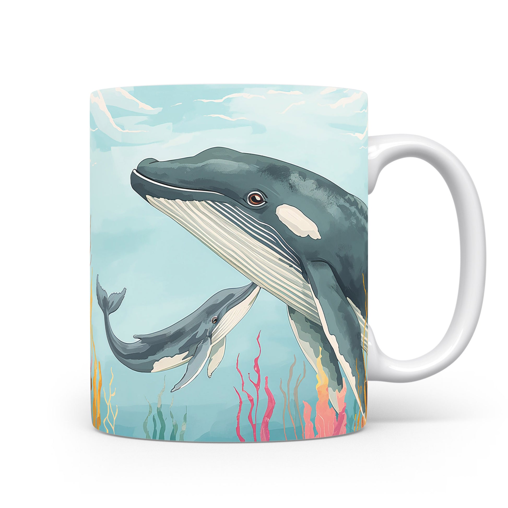 Velryby plující mezi korály na hrnku