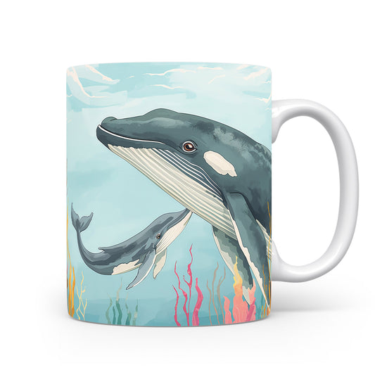 Velryby plující mezi korály na hrnku