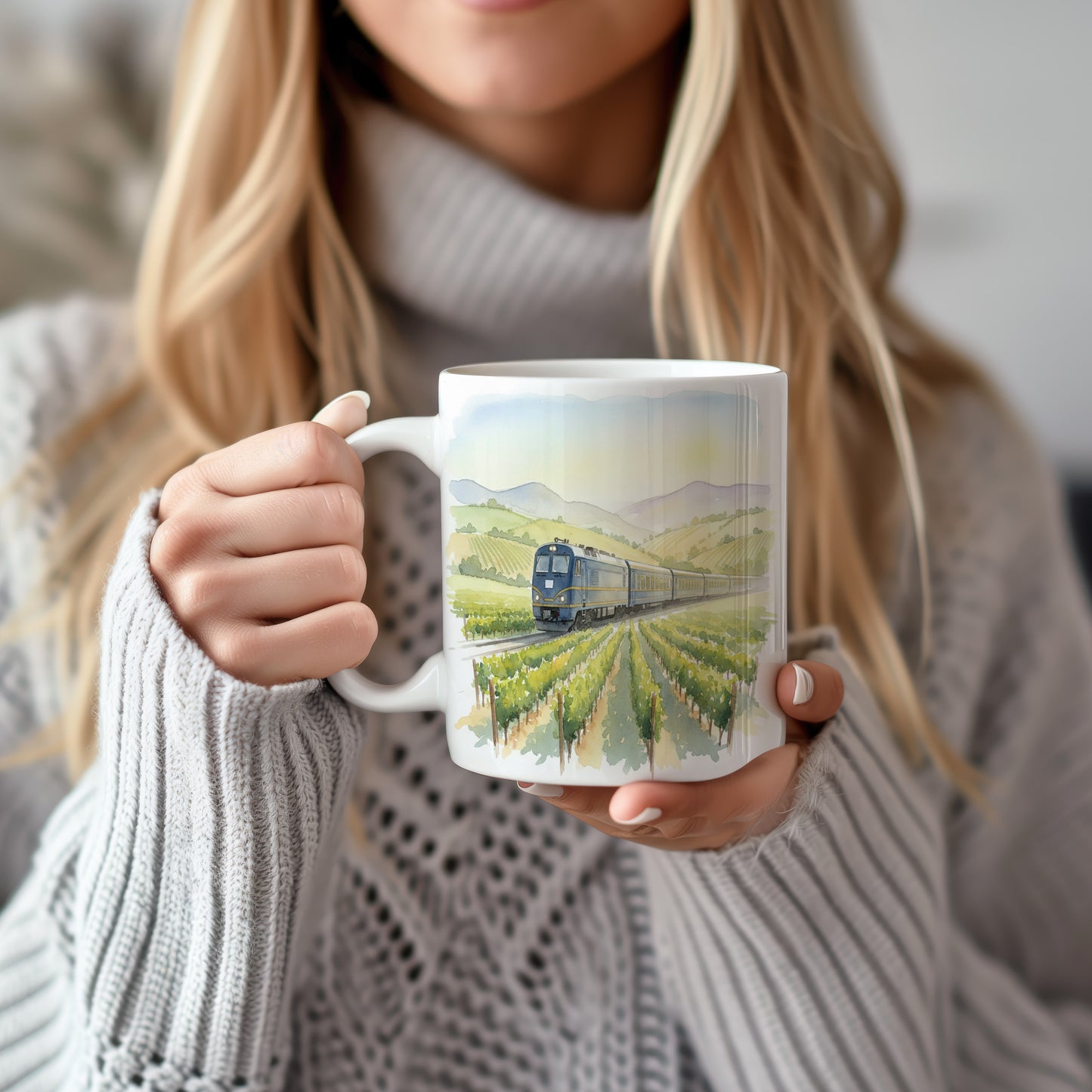 Hrnek s lokomotivou v údolí vinic