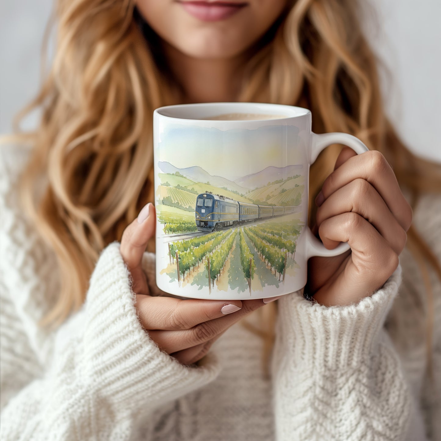 Hrnek s lokomotivou v údolí vinic