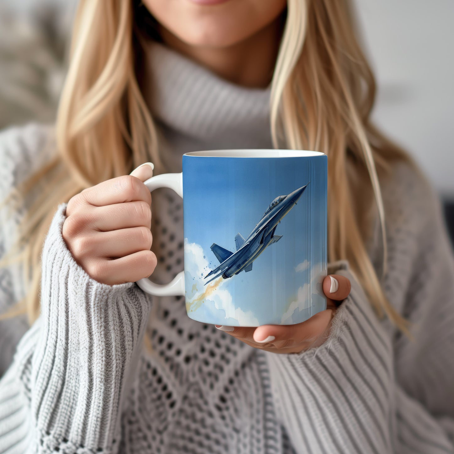 Hrnek s proudovým letounem na obloze