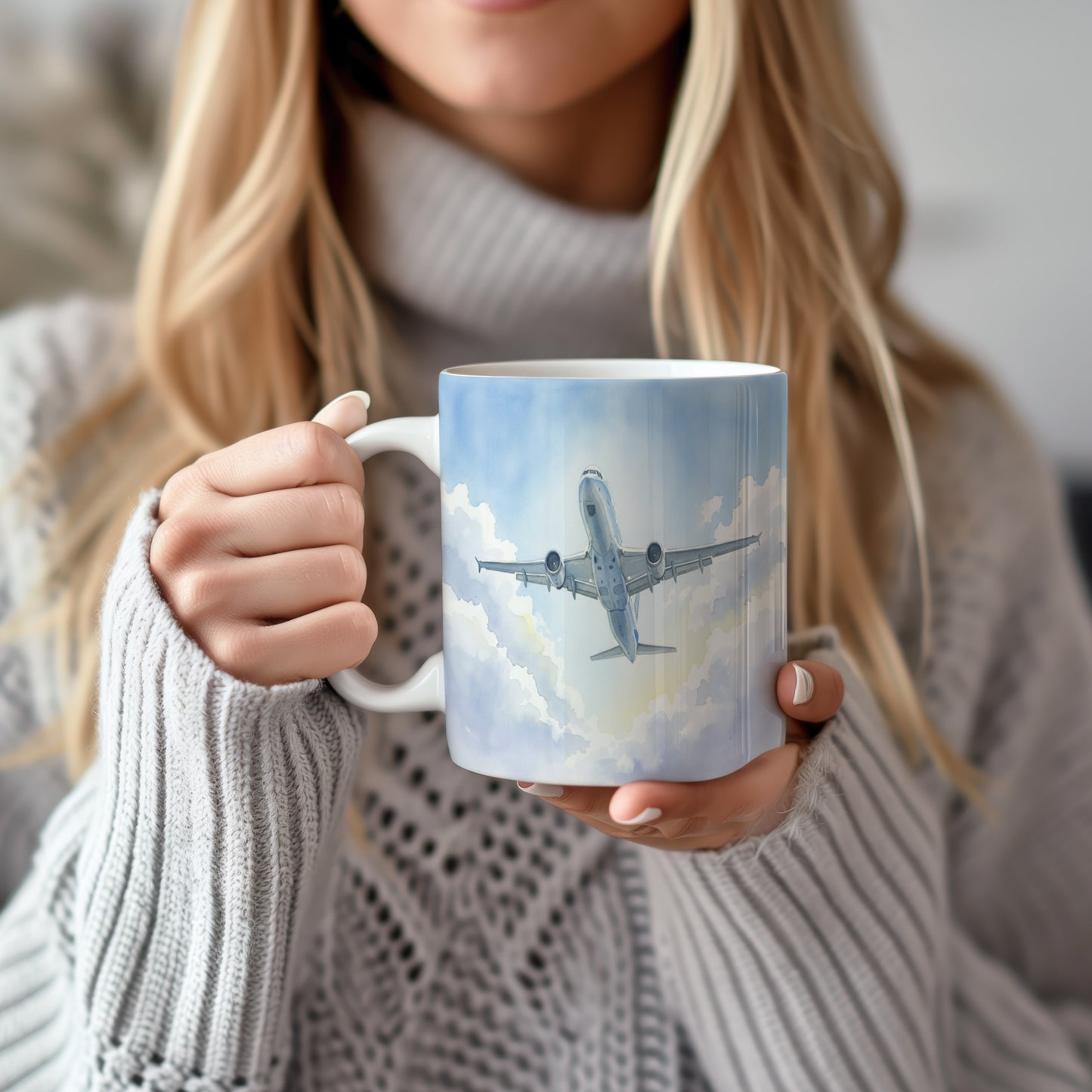 Hrnek s letadlem v modré obloze