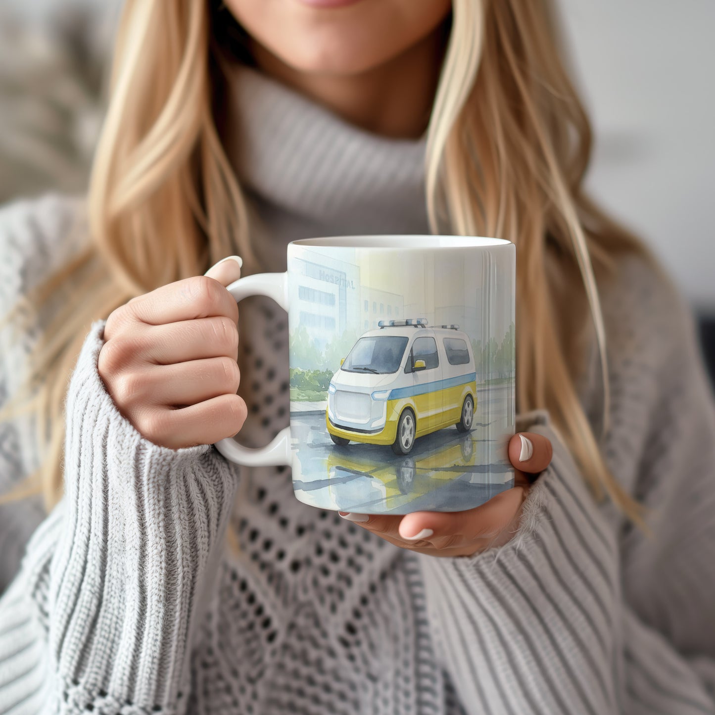 Hrnek s akvarelovou sanitkou před nemocnicí