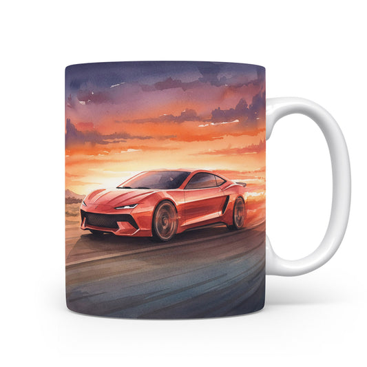 Hrnek s červeným sporťákem při západu slunce