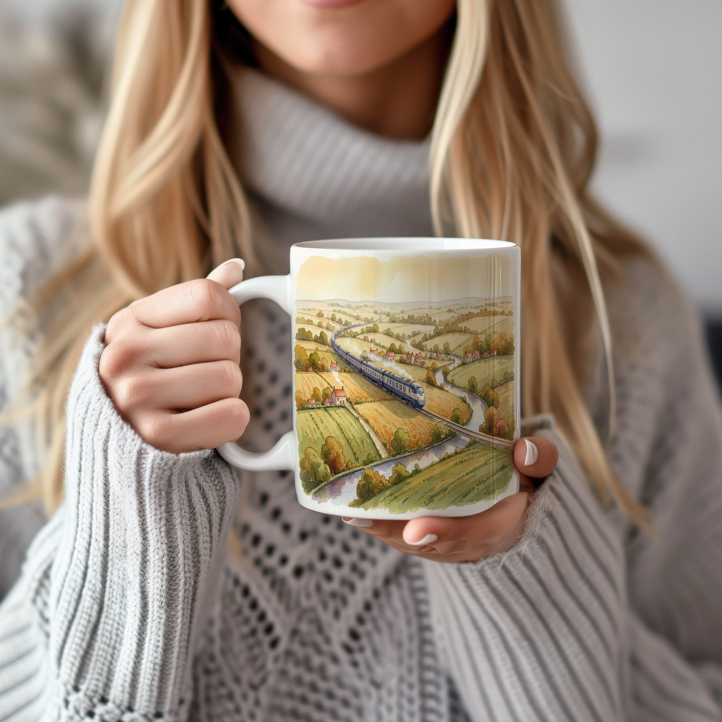 Hrnek s vlakem v malebné krajině