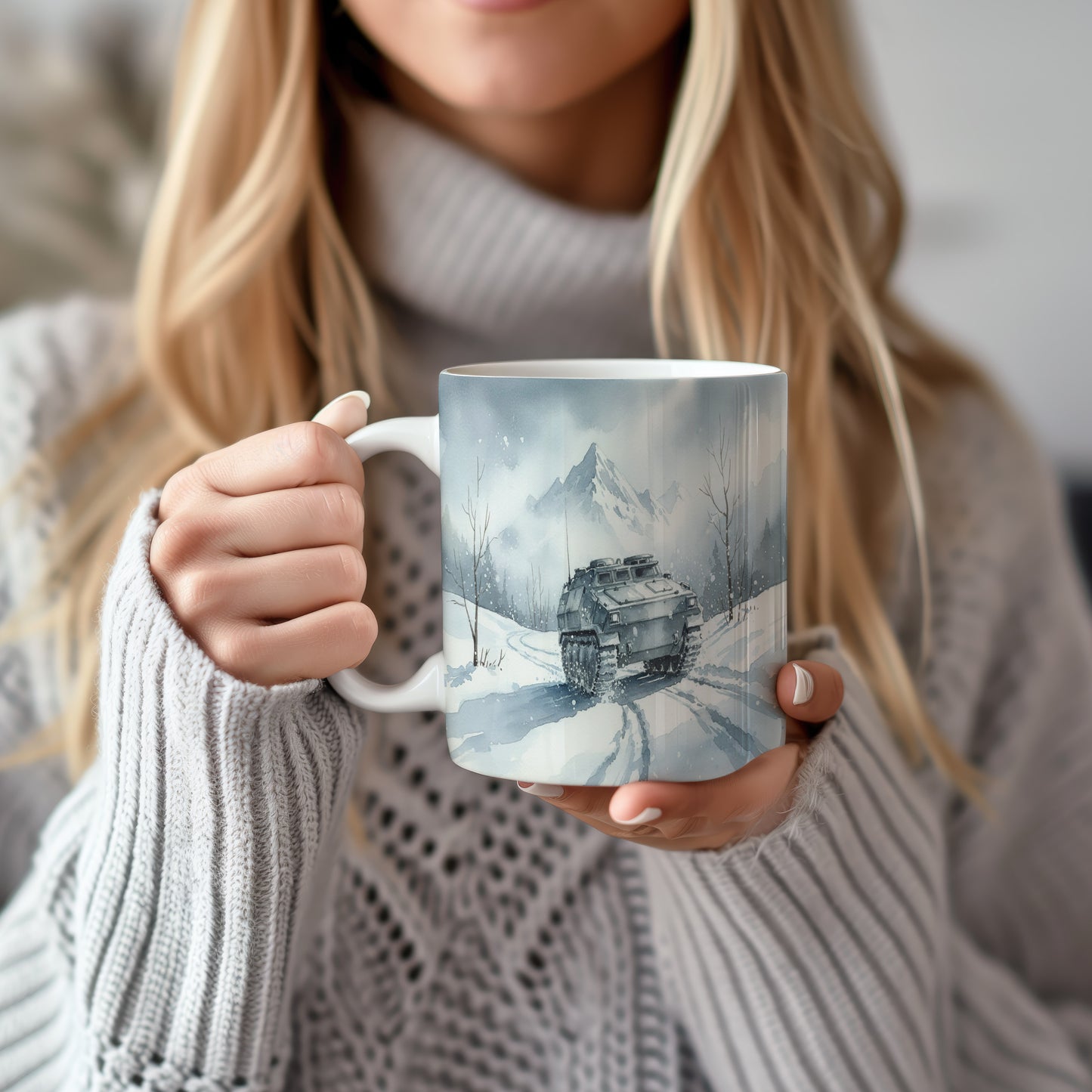 Hrnek s pásovým vozidlem v zimní krajině