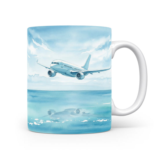 Hrnek s letadlem nad oceánem v akvarelu