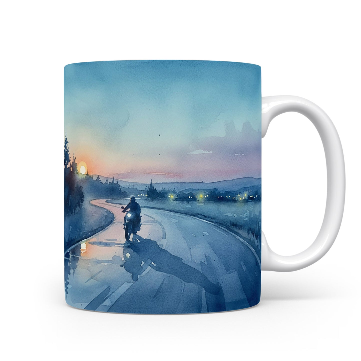 Motorka na silnici při západu slunce