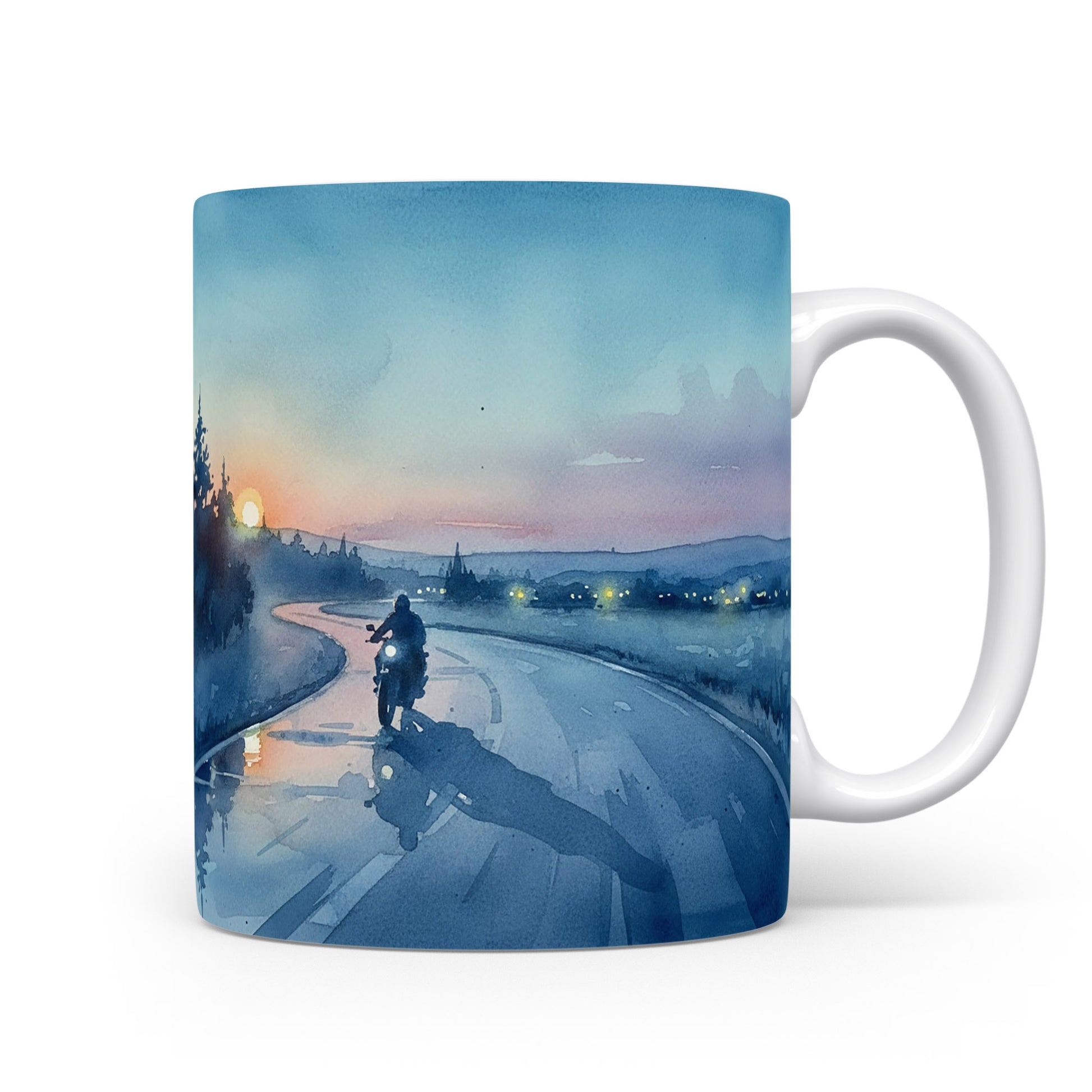 Motorka na silnici při západu slunce