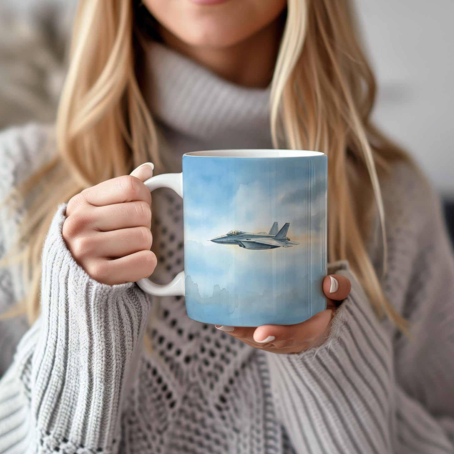 Hrnek s tryskáčem v modrém nebi