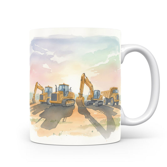 Hrnek se stavebními stroji při západu slunce