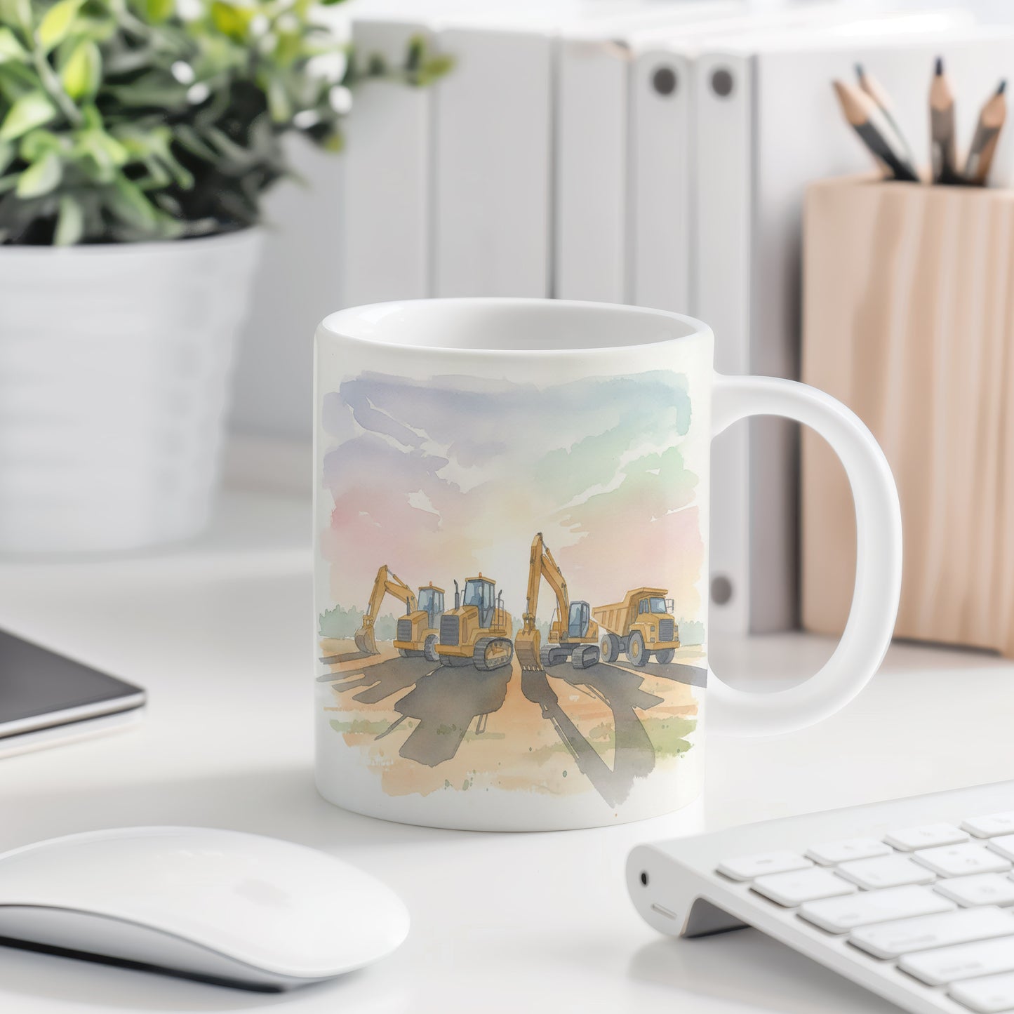 Hrnek se stavebními stroji při západu slunce