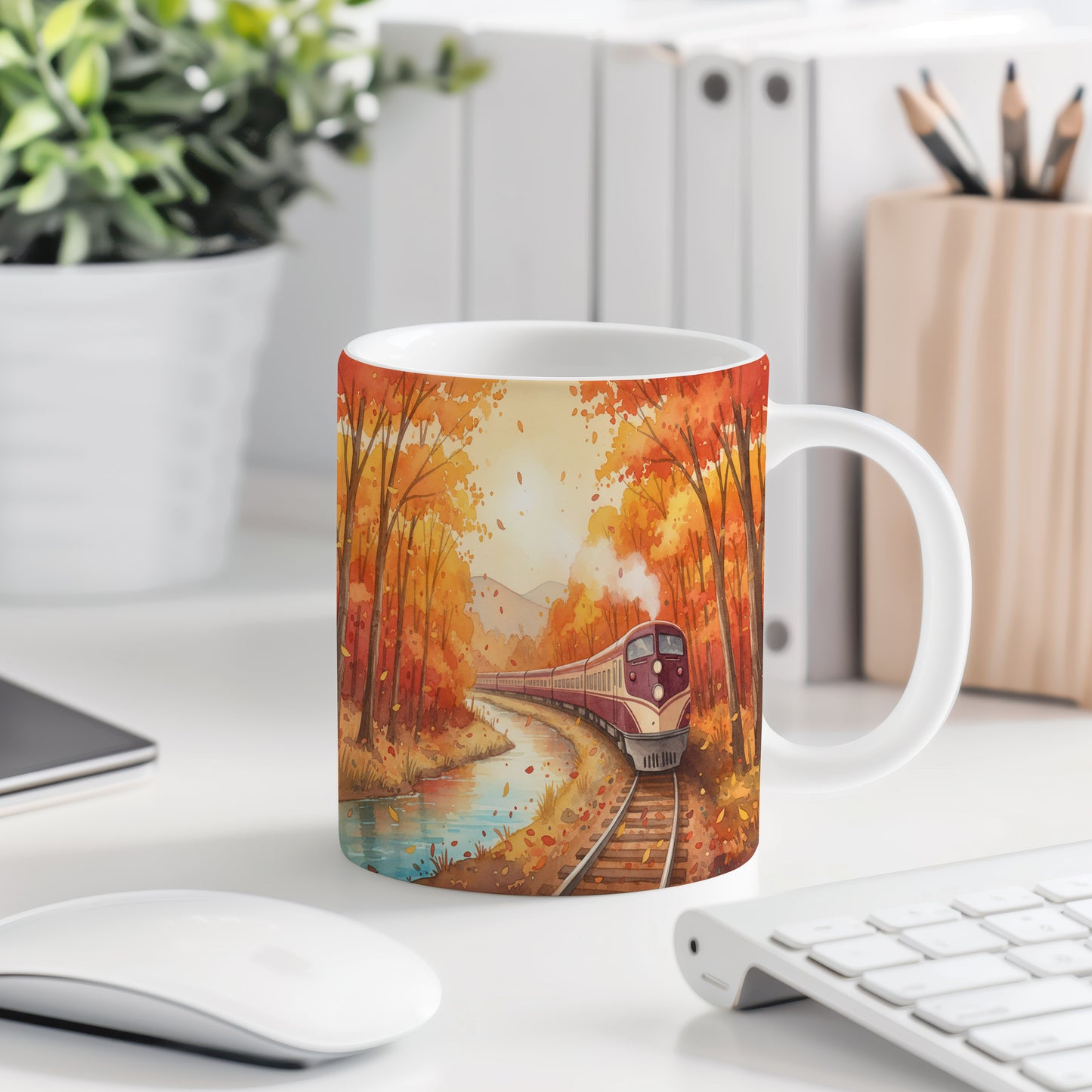 Hrnek s vlakem v podzimní krajině