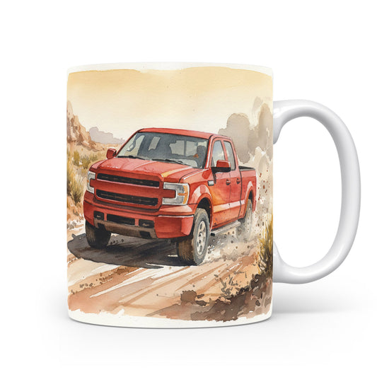 Hrnek s červeným pickupem v pouštní krajině