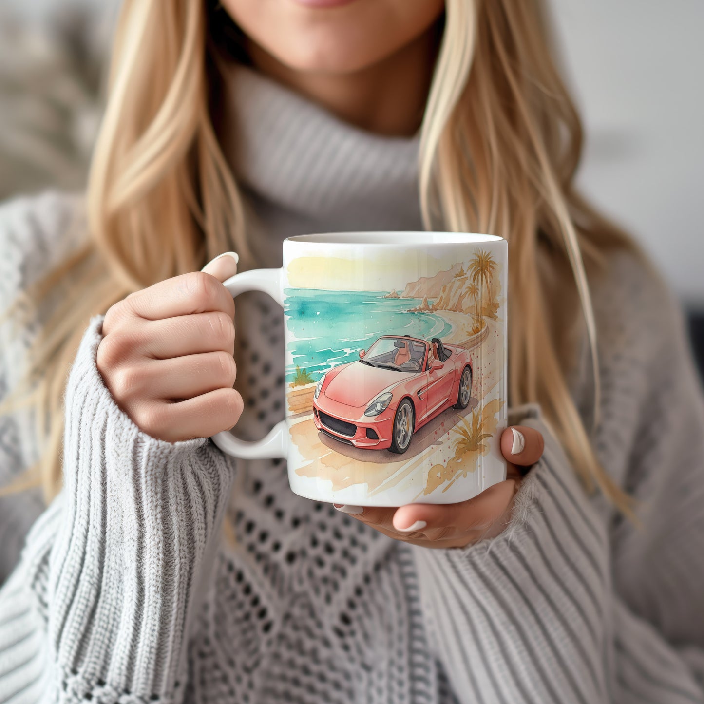 Hrnek s kabrioletem u mořského pobřeží